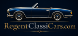 Cabriolet clássico azul escuro com detalhes em prata, carro vintage de luxo para colecionadores.